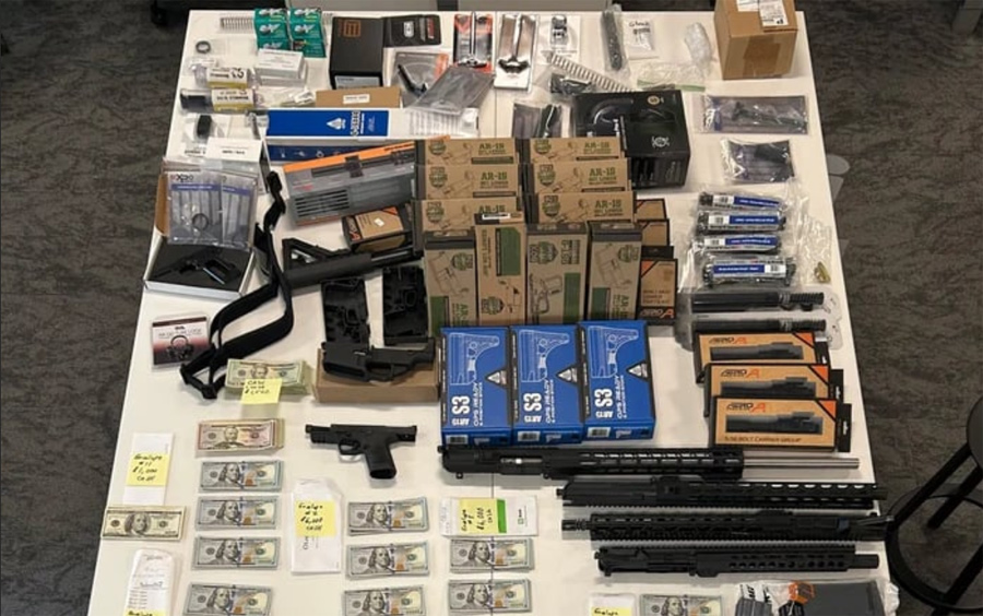 Seized guns, ammos and cash