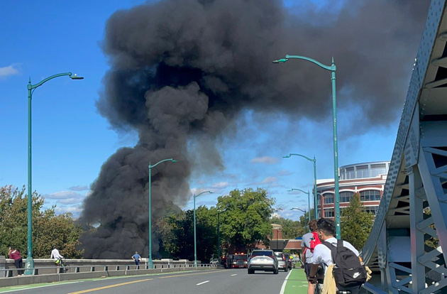 Smoke coming up from below the bridge before it was shut