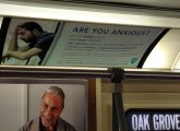 Anxious ad on the MBTA Orange Line