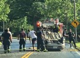 Arborway car flipped