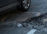 Pothole at the Jamaicaway and Perkins Street in Jamaica Plain