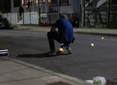 Detective and evidence markers on Abbotsford Street