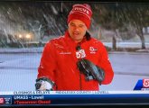 Channel 5 reporter with a snowball