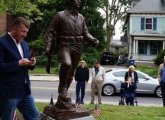 Prussman statue being unveiled