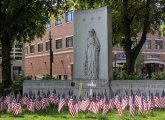 Flags at Korean and Vietnam War memorial in Adams Park, Roslindale