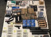 Seized guns, ammos and cash