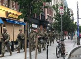 National Guardsmen march past Boston Marathon bombing memorial