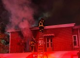 Firefighters at 519 Poplar St. fire