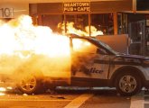 Boston Police cruiser on fire on Tremont Street.