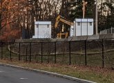 Temporary shelters under construction at Shattuck Hospital