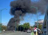 Smoke coming up from below the bridge before it was shut