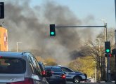 Smoke rising above Cummins Highway and Hyde Park Avenue