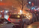 Car on fire outside Brassica in Forest Hills