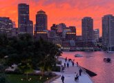 Red sky over downtown Boston and Boston Harbor