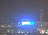 A very bright billboard at Albany Street and Frontage Road