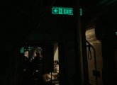 Inside a Green Line trolley with no lights on