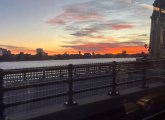 View of the sunset from a Red Line train crossing the Longfellow Bridge into Cambridge