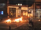 Trash on fire on Washington Street in Downtown Crossing