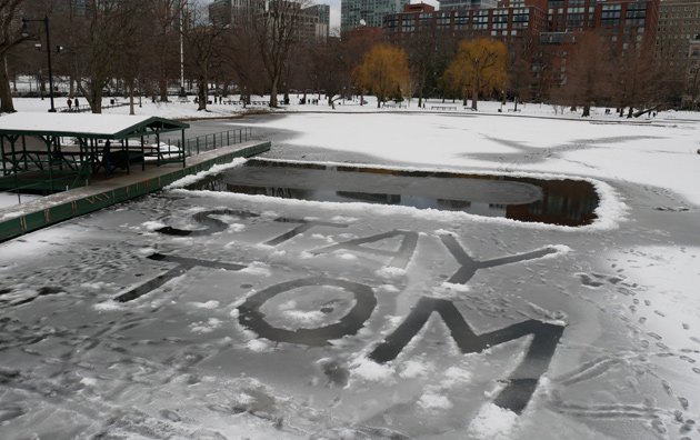 Message written in the ice in the Public Garden lagoon: Stay Tom