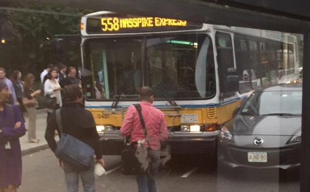 Bus vs. car in downtown Boston