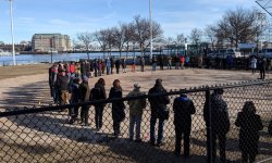 People gathered in a ring in the North End to commemorate the Great Molassses Flood