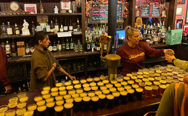 Tons of beers on the bar at the Burren in Somerville