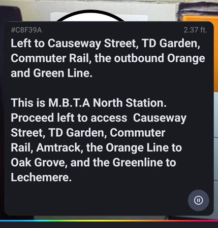 Left to Causeway Street, TD Garden, Commuter Rail, the outbound Orange and Green Line. This is MBTA North Station. Proceed left to access Causeway Street, TD Garden, Commuter Rail, Amtrack [sic], the Orange Line to Oak Grove, and the Greenline to Lechemere [sic].